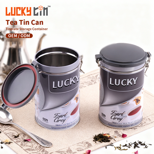 Fashion Design Custom Round Tinplate Matte Black Gold Stamping 250g Metal Packaging Tea Tin With Metal Seal